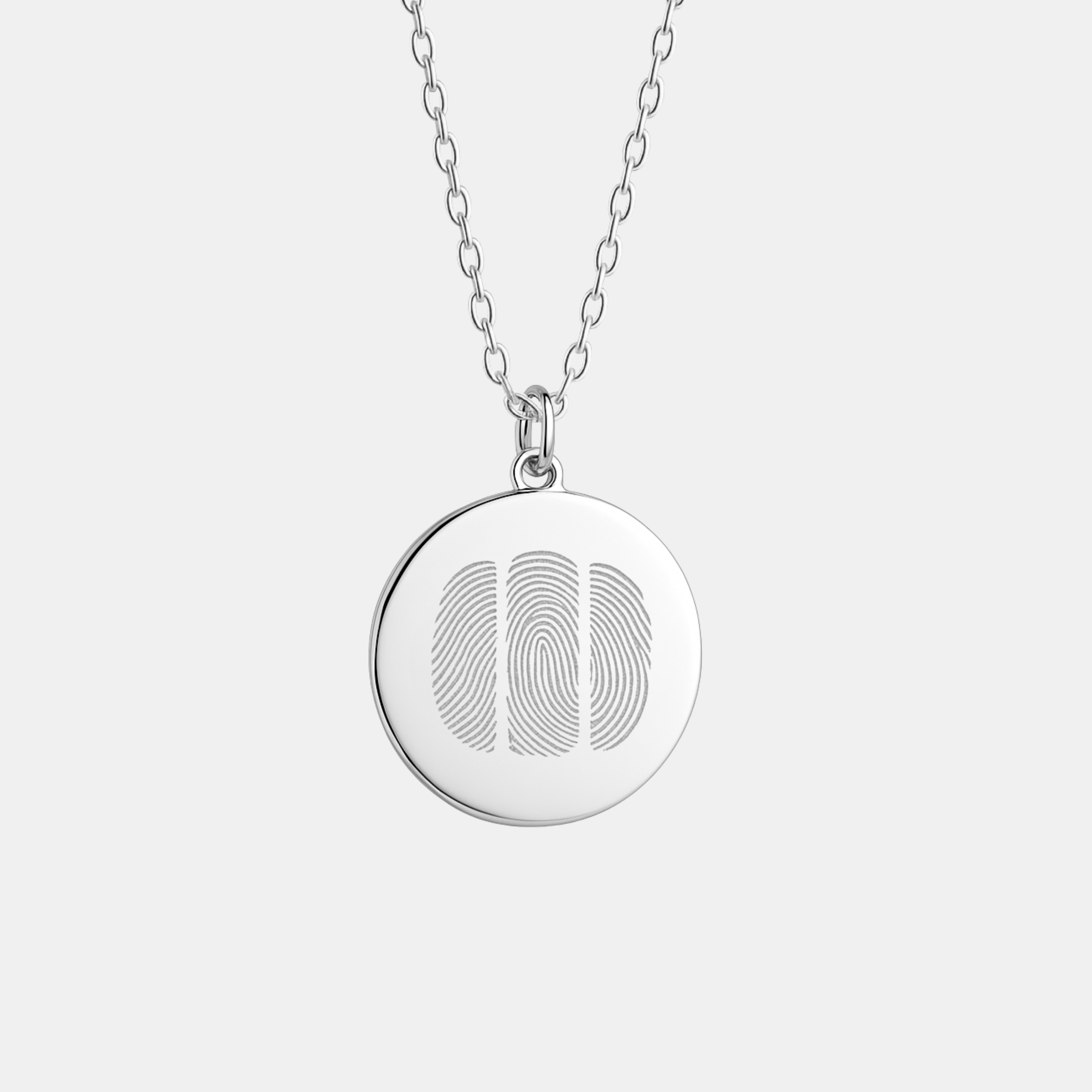Three fingerprint pendant necklace in 925 sterling silver featuring diamond-engraved fingerprints, crafted in-house by Danibydsgn.