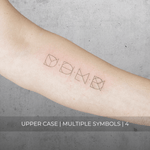 A minimalistic fine line tattoo of an overlapping Custom Logos design on a person's inner arm of a four symbol design in uppercase letters, exemplifying custom logo design, name tattoo design, and body art. This simple tattoo idea showcases personal branding and tattoo art, ideal for both name logos and wall art applications.