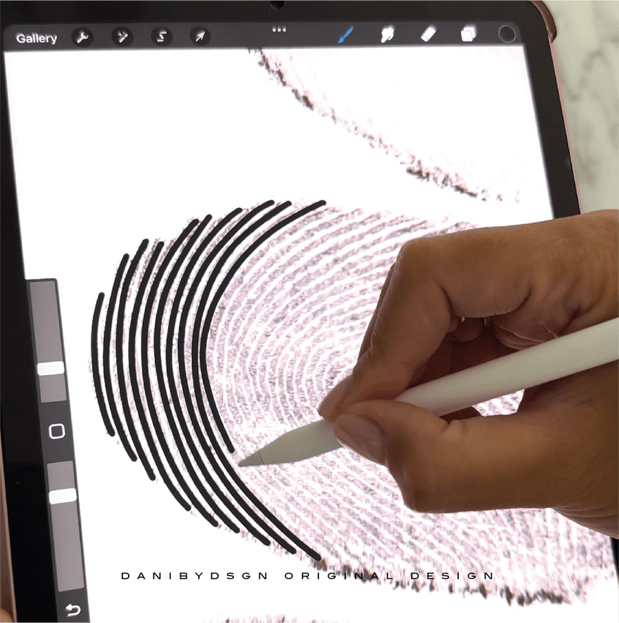 An engraved fingerprint ring that captures the unique pattern of a fingerprint and transforms it into a beautiful and symbolic piece of jewelry