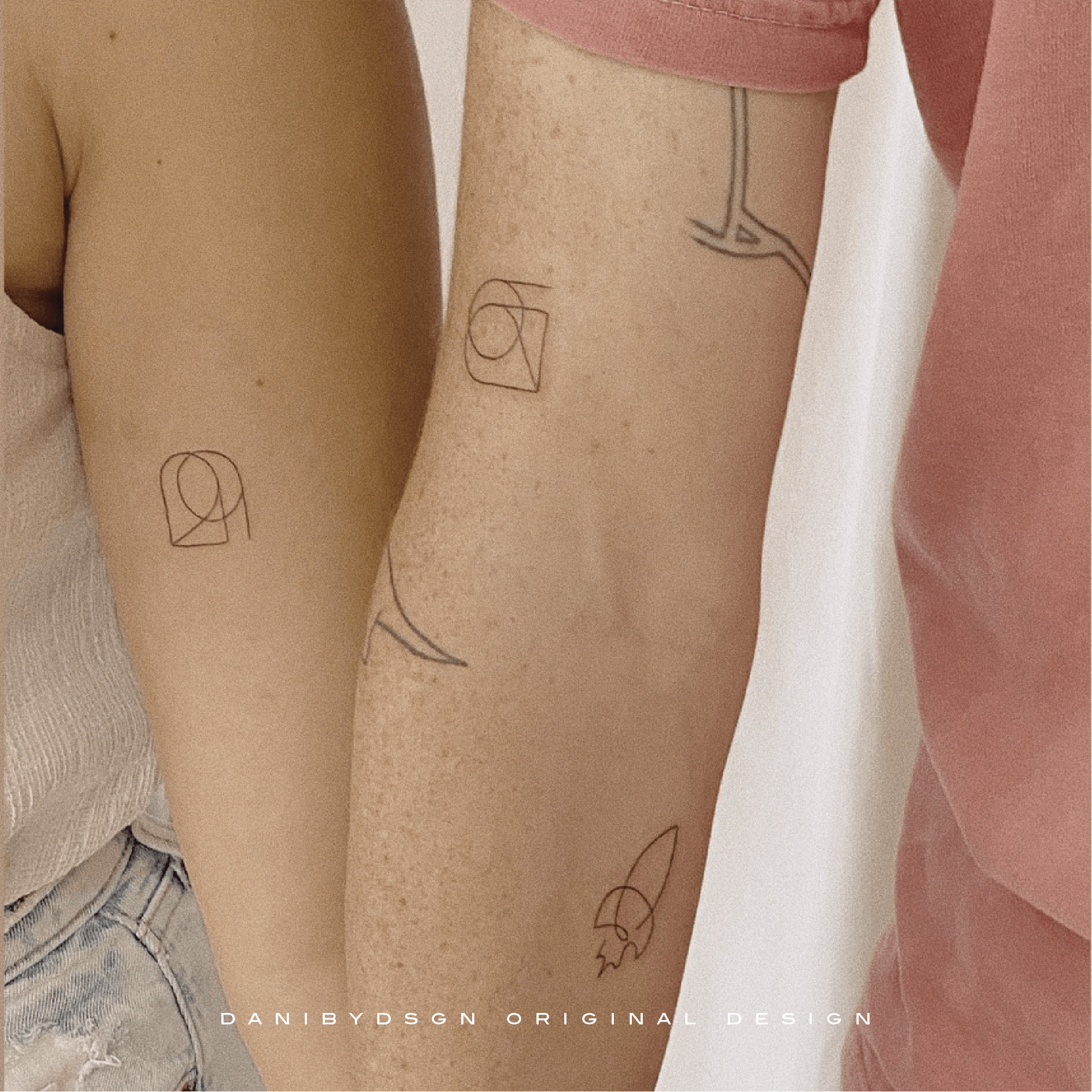 A couple showcase their matching fineline tattoo designs by Danibydsgn, commemorating their wedding anniversary date with a unique symbol that embodys their bond. These minimalist tattoos reflect a bespoke combination of personal branding and body art, serving as a timeless reminder of their special day. Danibydsgn is the original name logo creator with 30,000 personalized designs completed globally and over 1,700+ five star reviews.