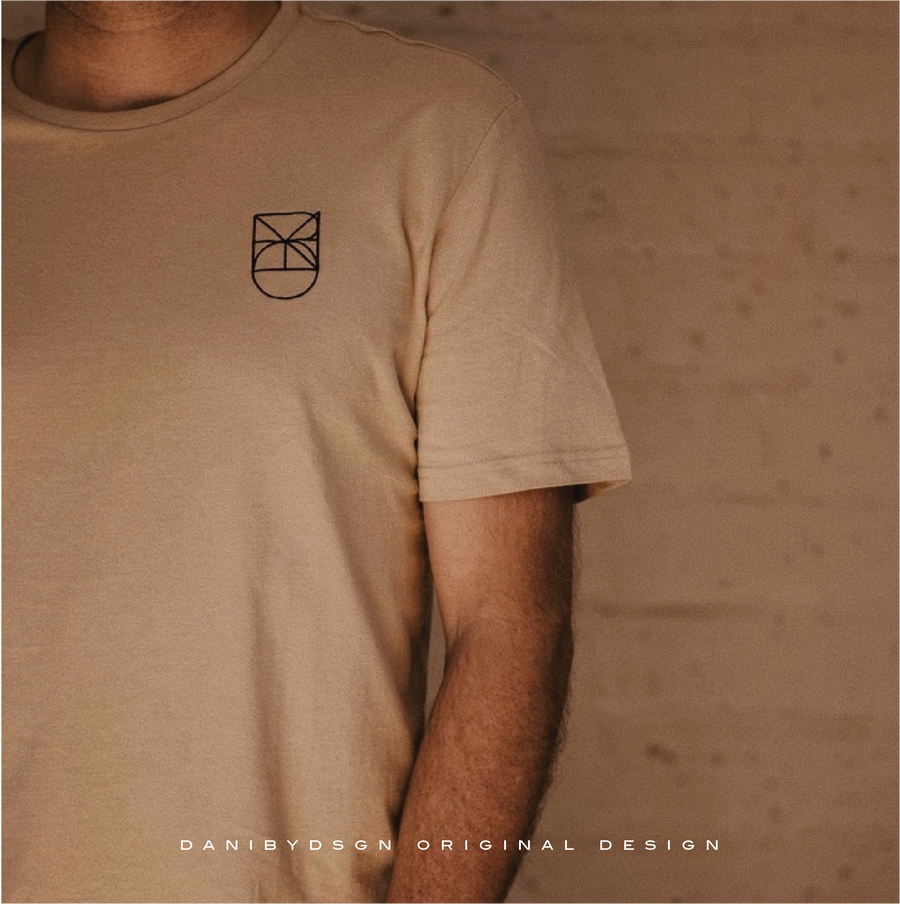 A minimalist symbol embroide on apparel and clothing featuring a simple and clean geometric shape