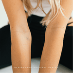 The photo is of a Joined Custom Logo used as a fineline tattoo on the arm of a lady.  The design is a dynamic fusion of two or more symbols into an entwined logo joined diagonally.  The designs are custom names or numbers, ideal for personal branding or as wall art or clothing branding. Custom logo design, translates into a name tattoo design and body art embodying the spirit of simple tattoo ideas while resonating with the artistry of an illustrator.