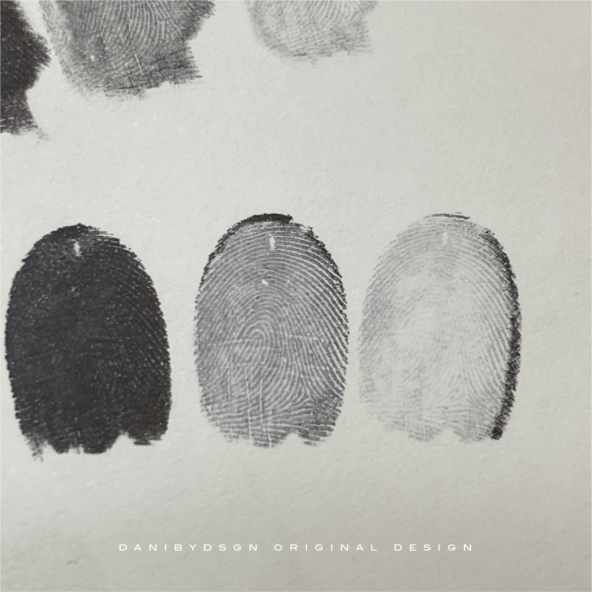 Close-up of fingerprint impressions used for custom fingerprint jewelry engraving, original design by Danibydsgn.